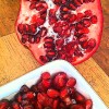 Pomegranate cut open and seeded